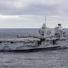El portaaviones británico HMS Queen Elizabeth, que transporta cazas de quinta generación F-35B Lightning II, se ha transferido al mando de la OTAN por primera vez en la historia-32