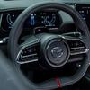 Una pequeña foto de la Mazda EZ-6 Sports Edition - vista lateral