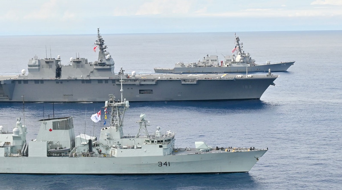 El USS Ralph Johnson y el HMCS Ottawa atravesaron el estrecho de Taiwán bajo la vigilancia de un destructor chino de misiles guiados, el CNS Hohhot. El USS Ralph Johnson y el HMCS Ottawa atravesaron el estrecho de Taiwán bajo la vigilancia de un destructor chino de misiles guiados, el CNS Hohhot.