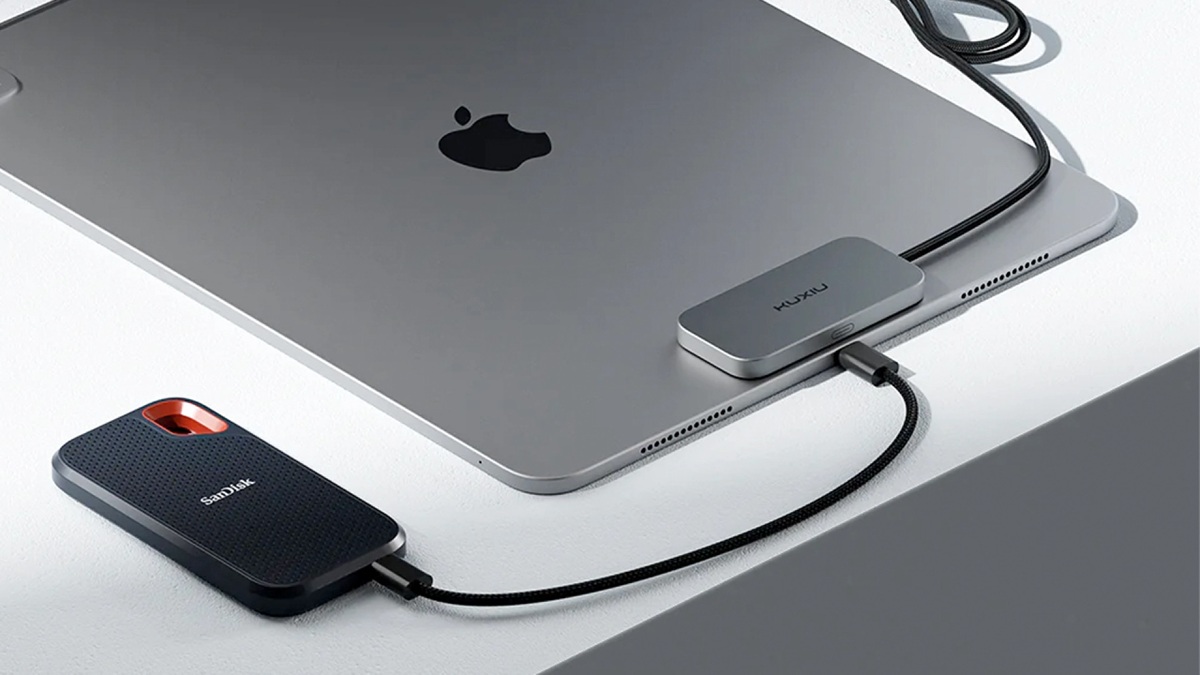 ¡Dale libertad al puerto USB de tu iPad! Kuxiu ofrece un accesorio de carga magnético que utiliza el Conector Inteligente ¡Dale libertad al puerto USB de tu iPad! Kuxiu ofrece un accesorio de carga magnético que utiliza el Conector Inteligente