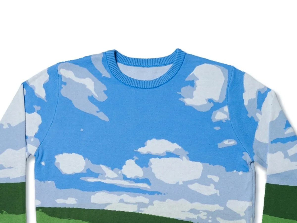 Microsoft ha lanzado un feo jersey navideño al estilo del famoso fondo de pantalla de Windows XP Microsoft ha lanzado un feo jersey navideño al estilo del famoso fondo de pantalla de Windows XP
