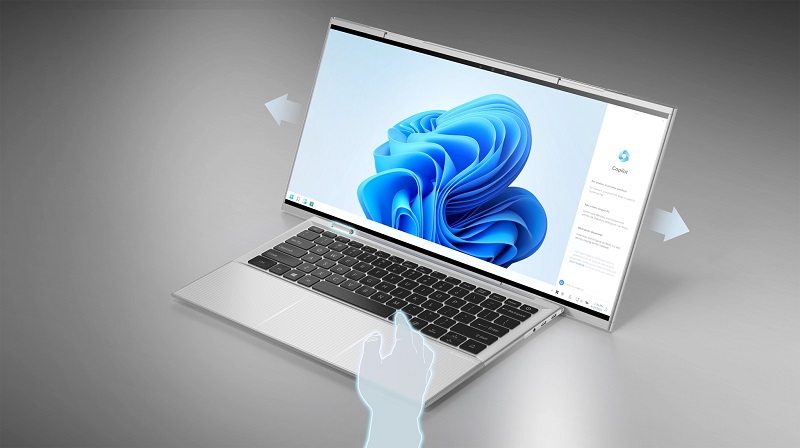 Portátil Compal con pantalla retráctil en acción