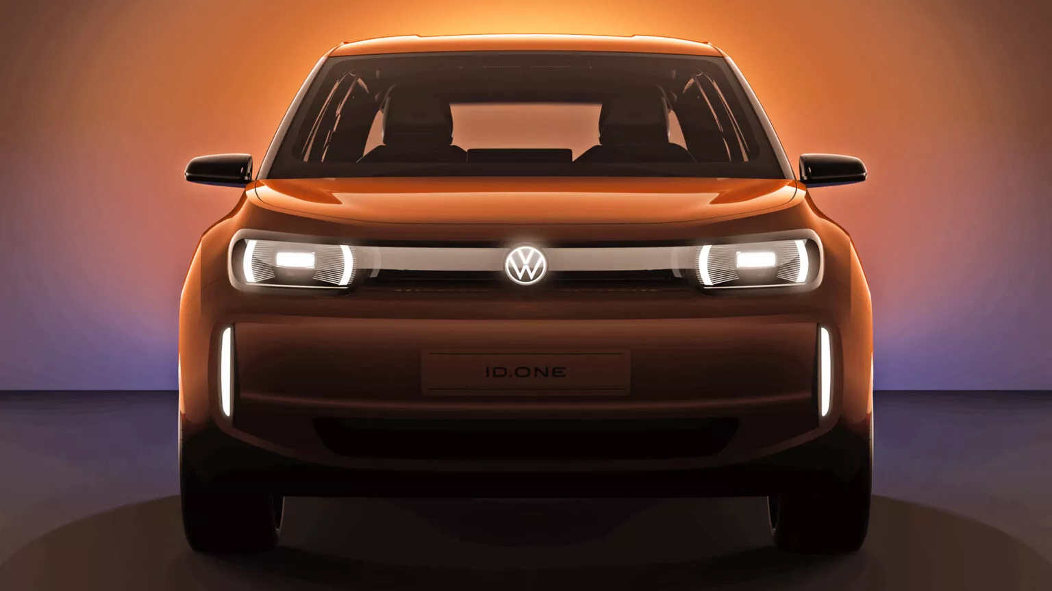 Primer teaser del nuevo coche eléctrico de Volkswagen con "ID.One" escrito en lugar de la matrícula.